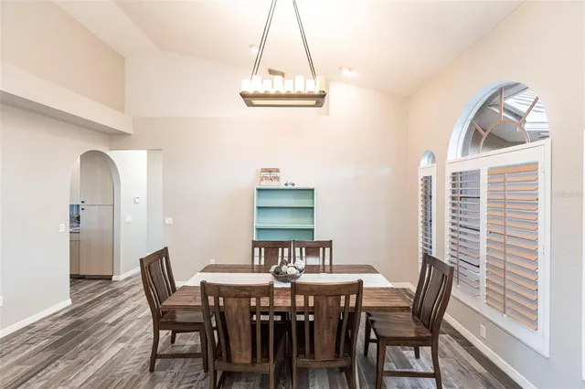 a view of a dining room with furniture