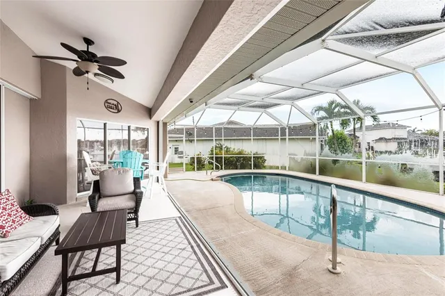 a bathroom with a granite countertop sink vanity and a mirror