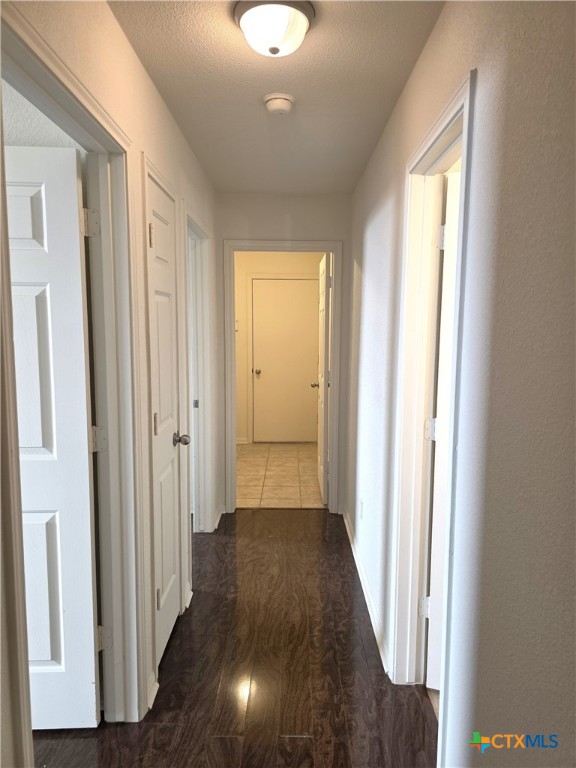 2203 Riley Drive Killeen, TX 76542 - Photo 14 of 22 a view of a hallway with wooden floor and closet