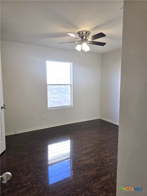 2203 Riley Drive Killeen, TX 76542 - Photo 16 of 22 a view of an empty room with wooden floor and a window