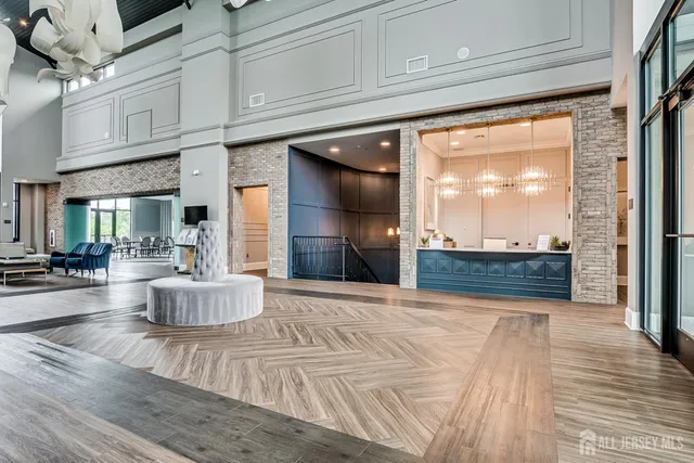 a view of a living room and entry way