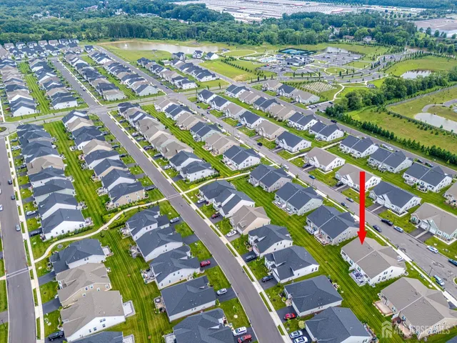 a view of swimming pool with a yard