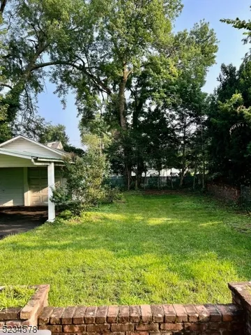 a view of a house with a garden