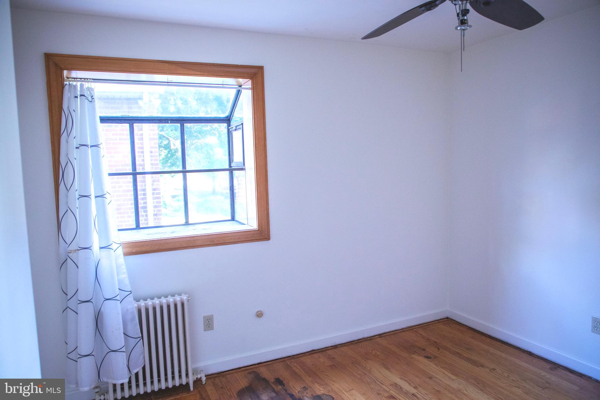 9406 Seminole Street Silver Spring, MD 20901 - Photo 15 of 32 a view of a room with a window