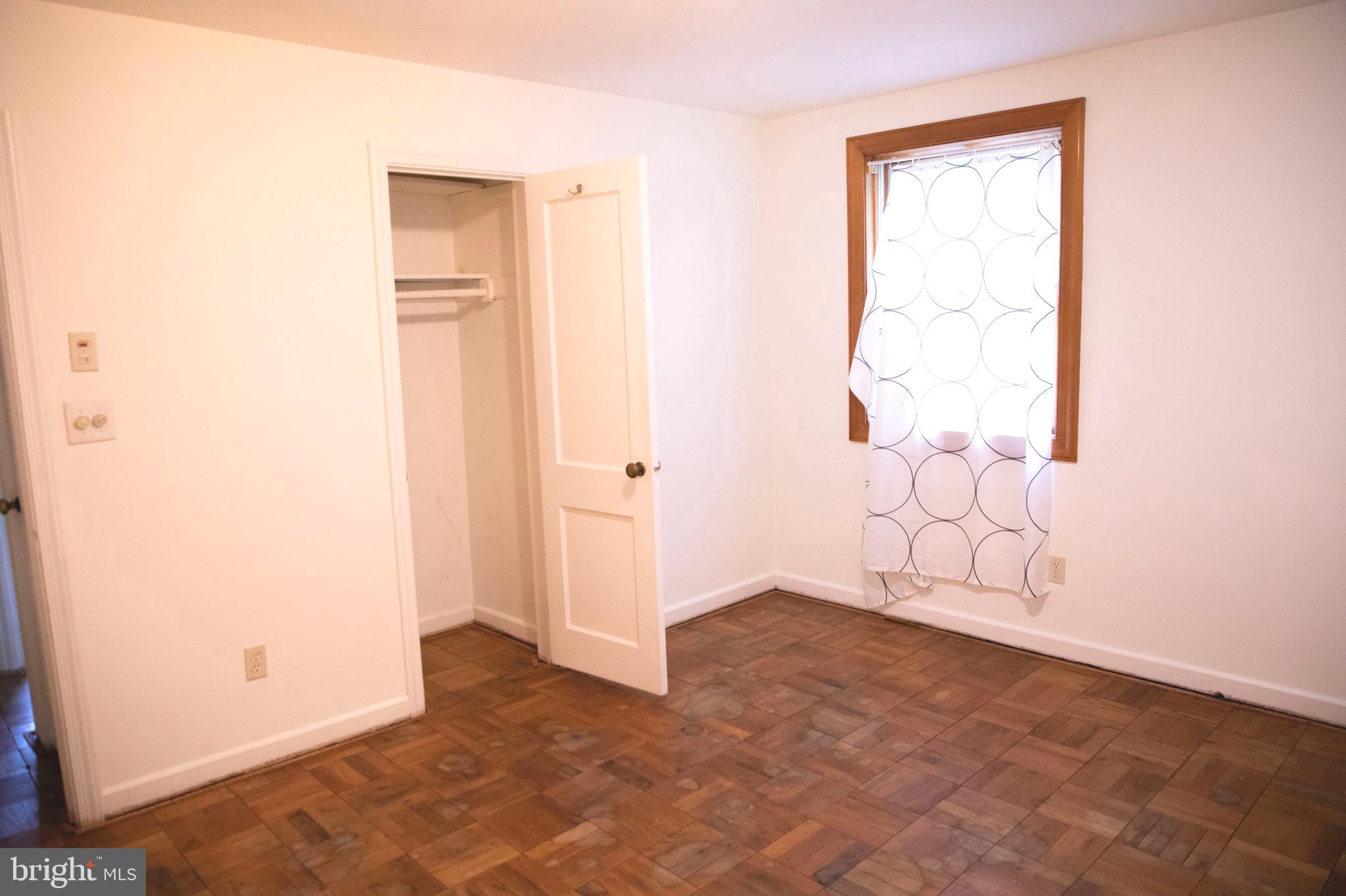 9406 Seminole Street Silver Spring, MD 20901 - Photo 19 of 32 an empty room with cabinet