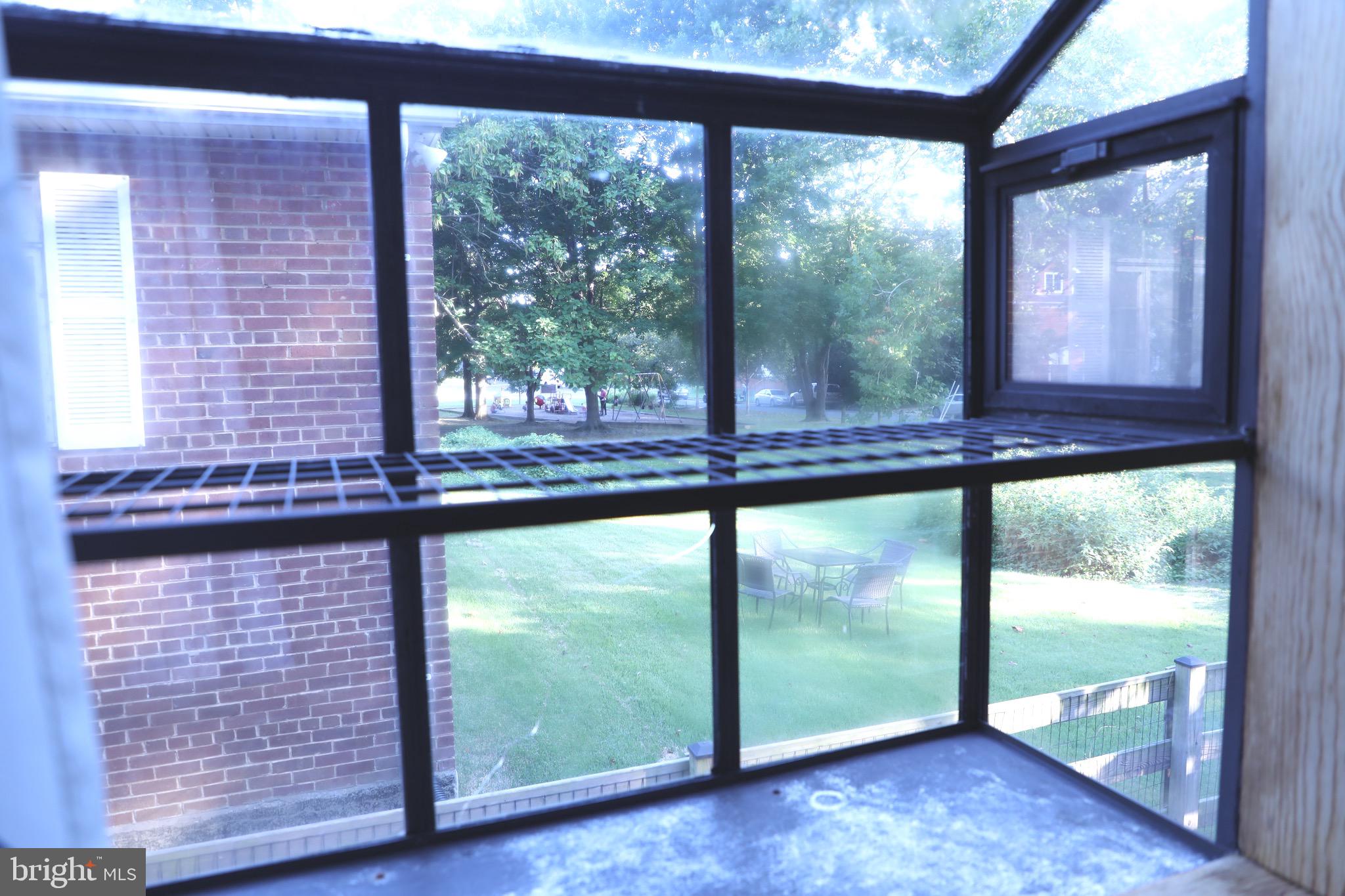 9406 Seminole Street Silver Spring, MD 20901 - Photo 20 of 32 a view of a room with a large window