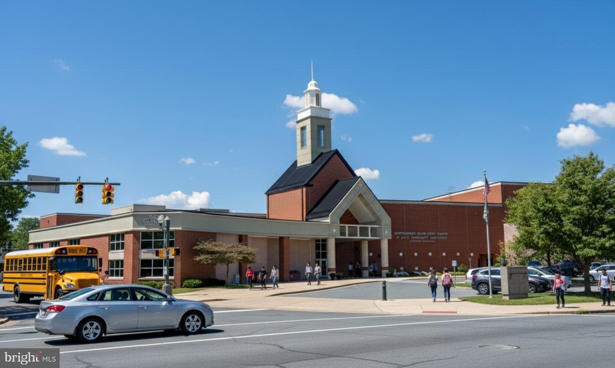 9406 Seminole Street Silver Spring, MD 20901 - Photo 30 of 32 a view of a cars park in front of building