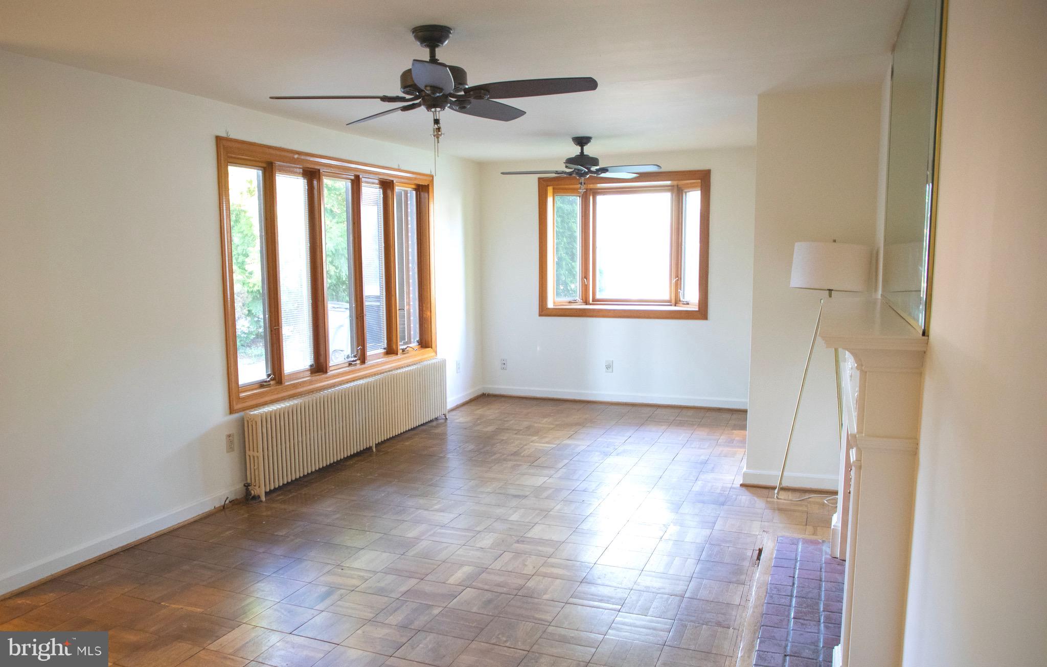 9406 Seminole Street Silver Spring, MD 20901 - Photo 7 of 32 a view of an empty room with a window