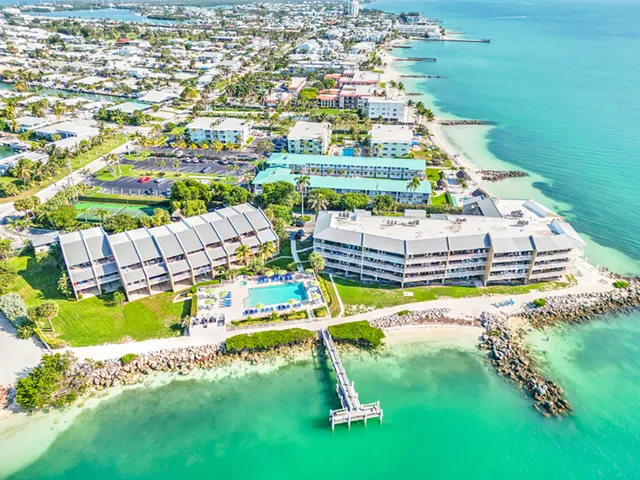 a view of a balcony with table and chairs