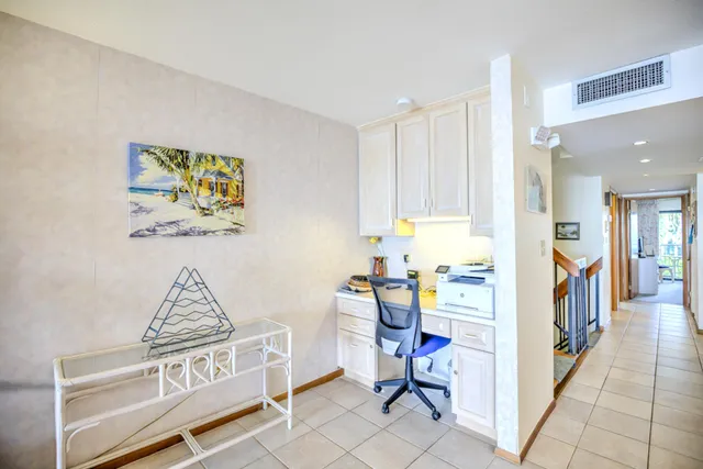 a living room with furniture and window