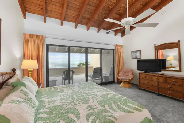 a view of swimming pool with outdoor seating and yard in back