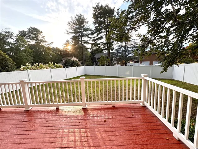 a view of a house with swimming pool and sitting area
