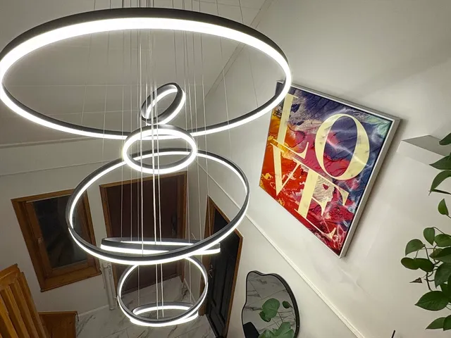 a close view of light fixtures and a sink