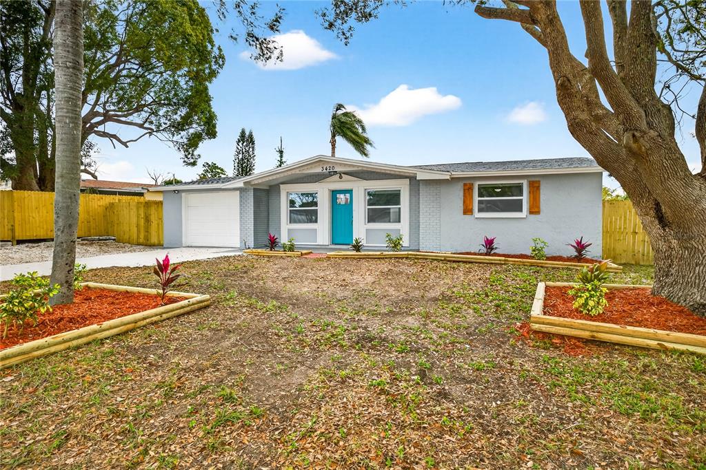 a front view of house with yard