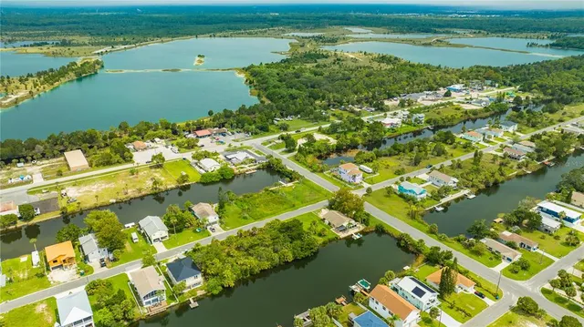a view of an ocean and a houses