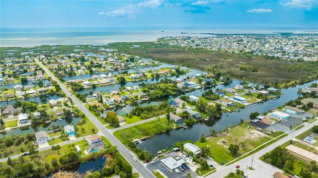 a view of a city with an ocean