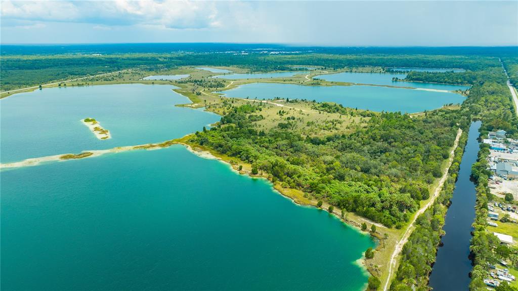 0 Rose Arbor Drive Hernando Beach, FL 34607 - Photo 23 of 24 a view of a city and a lake view