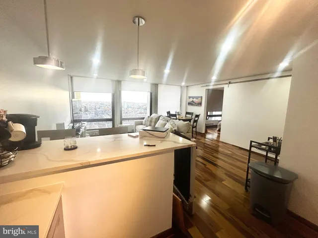 a room with sink washer and dryer