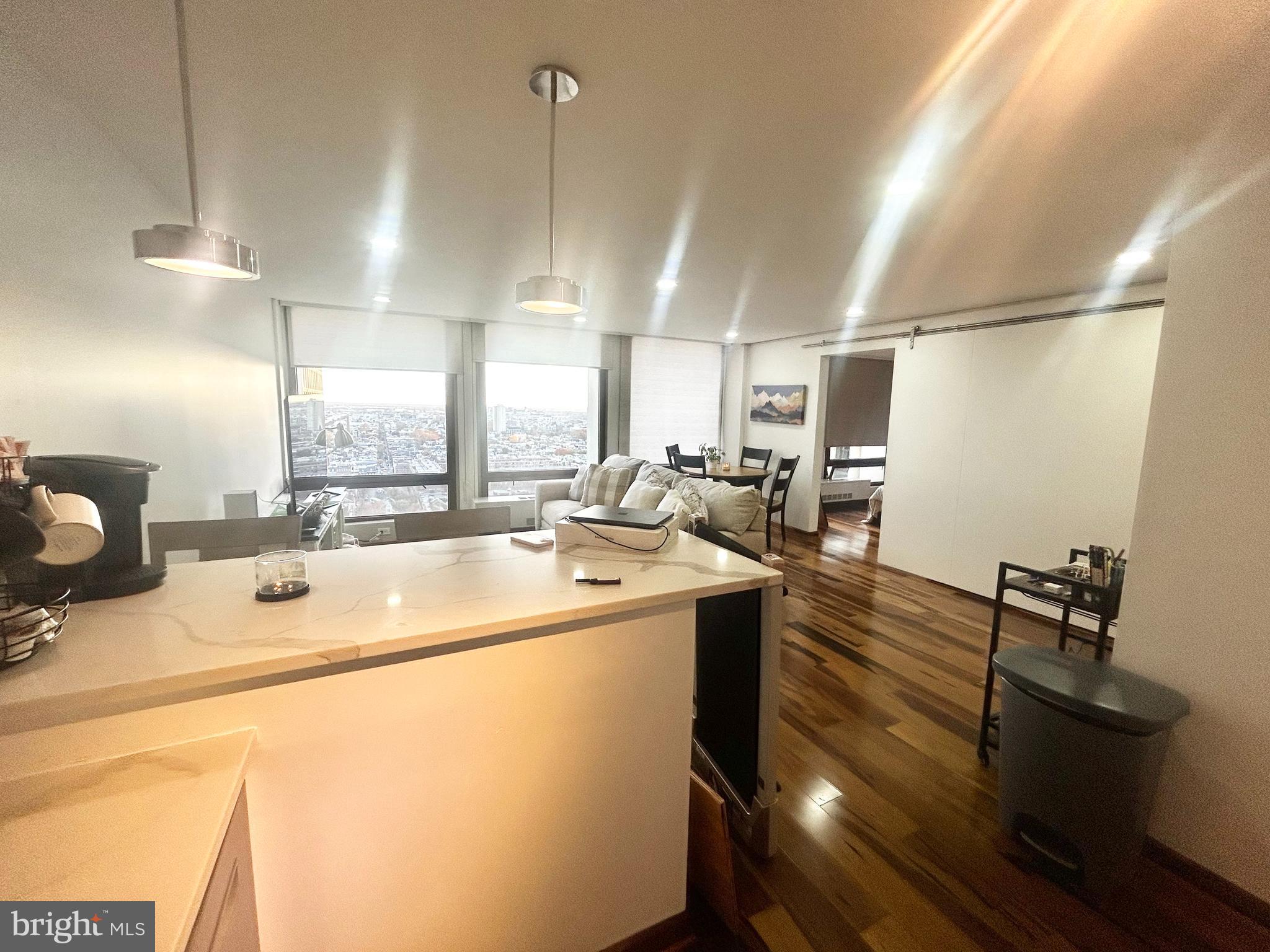 200 Locust Street, Unit 27H Philadelphia, PA 19106 - Photo 3 of 9 a room with sink washer and dryer