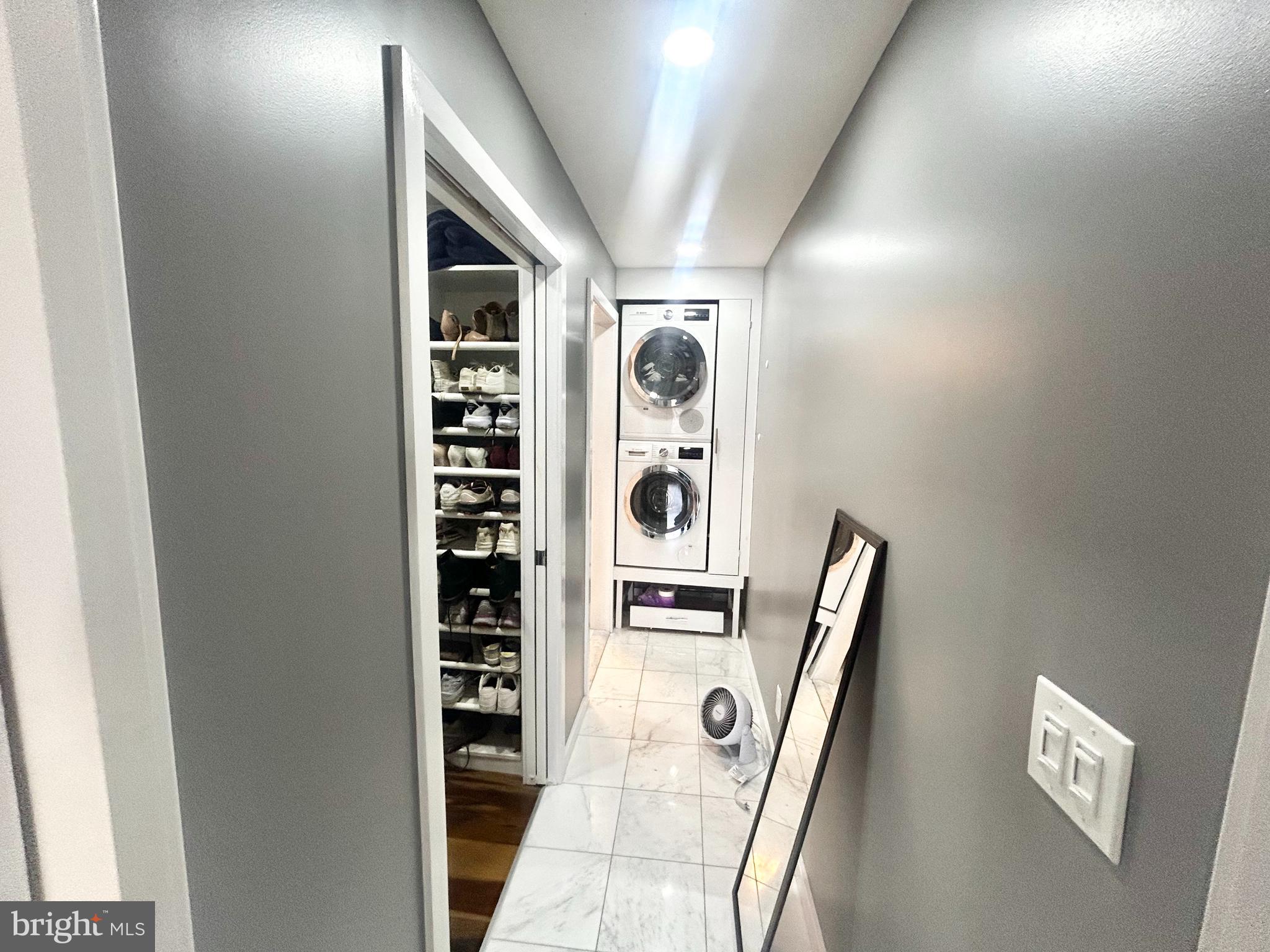200 Locust Street, Unit 27H Philadelphia, PA 19106 - Photo 9 of 9 a view of front door with cabinets