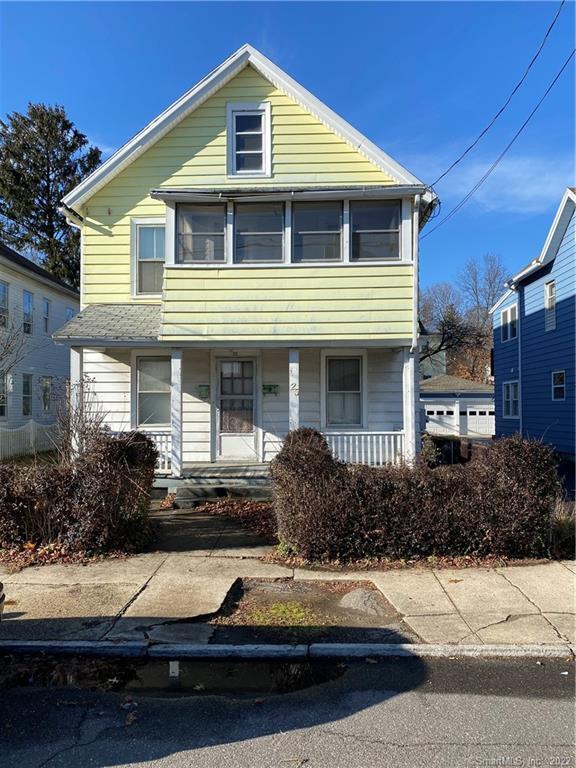 25 Howard Avenue Ansonia, CT 06401 - Photo 1 of 1 a front view of a house with garden
