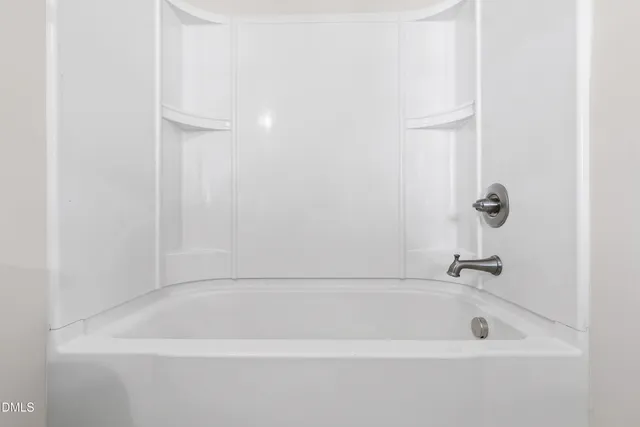 a bathroom with a tub