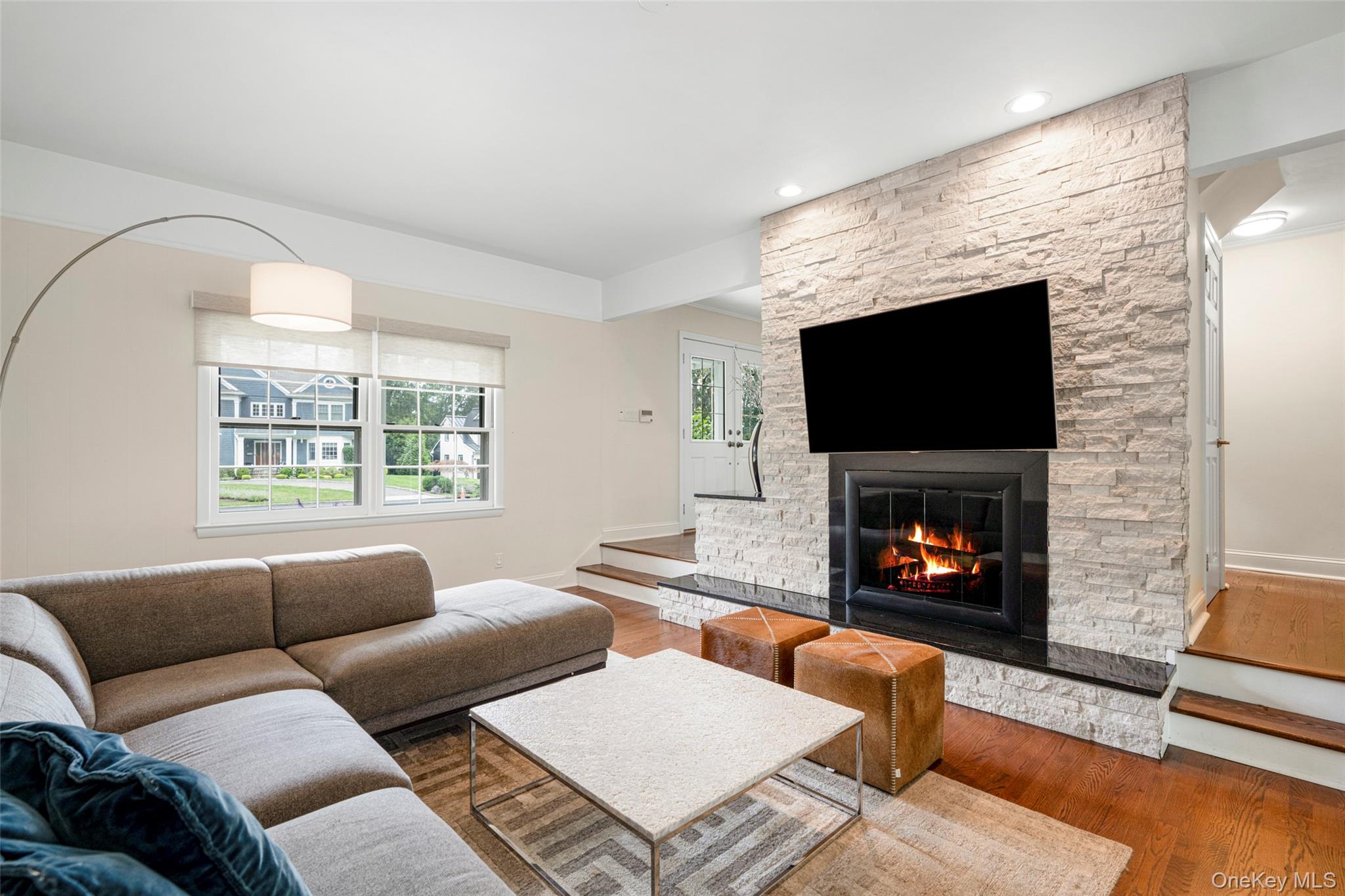 6 Trails End Rye, NY 10580 - Photo 14 of 37 Cozy Family Room with fireplace.