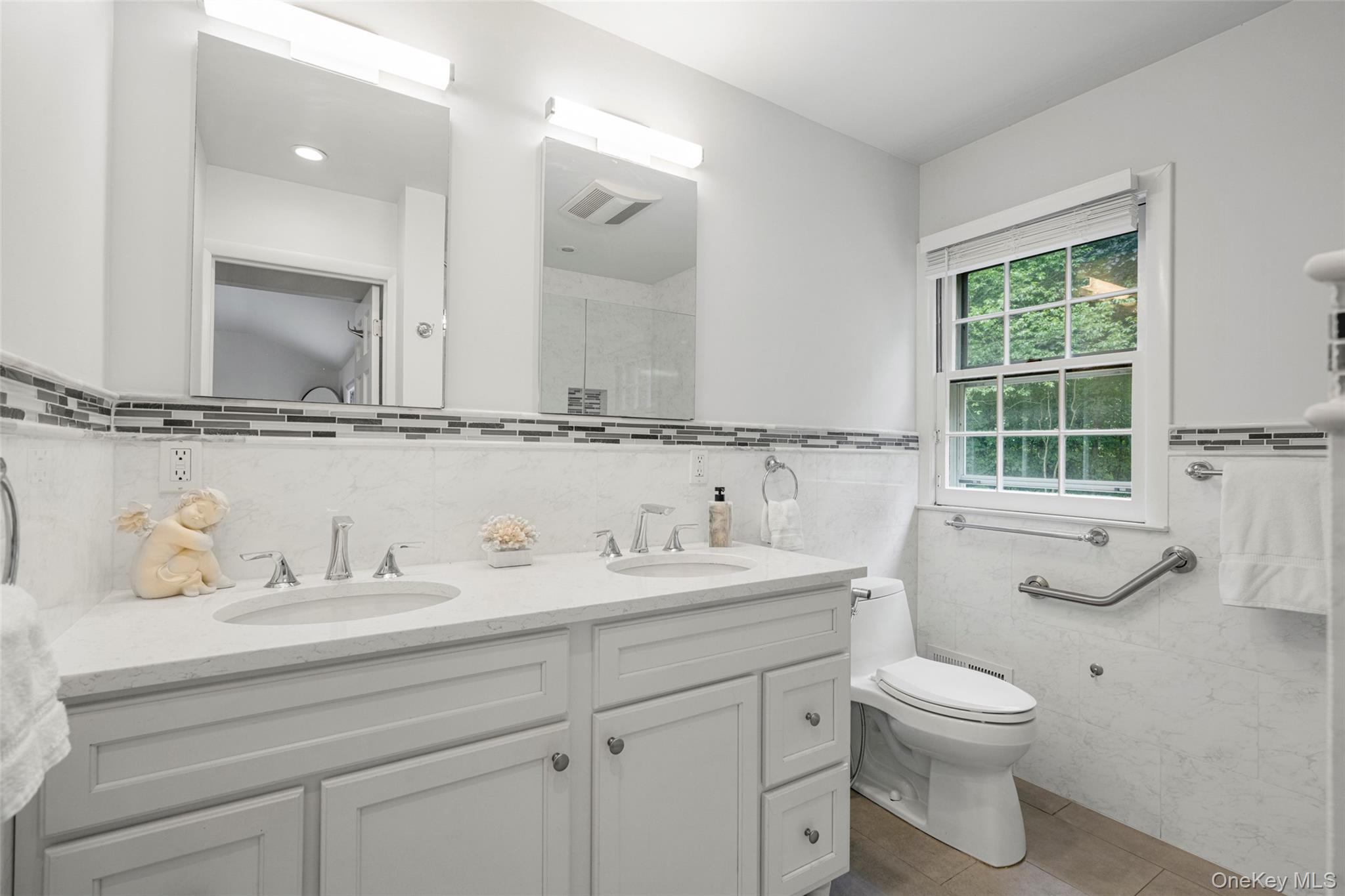 6 Trails End Rye, NY 10580 - Photo 18 of 37 Updated Primary Bath with dual vanity.