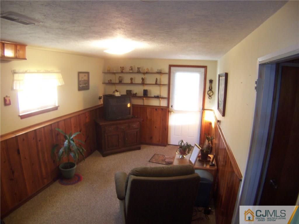169 North Hill Road Colonia, NJ 07067 - Photo 8 of 19 a room with furniture and a window