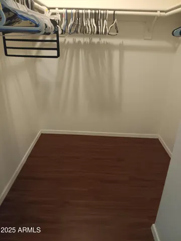 a view of a room with racks on the wall