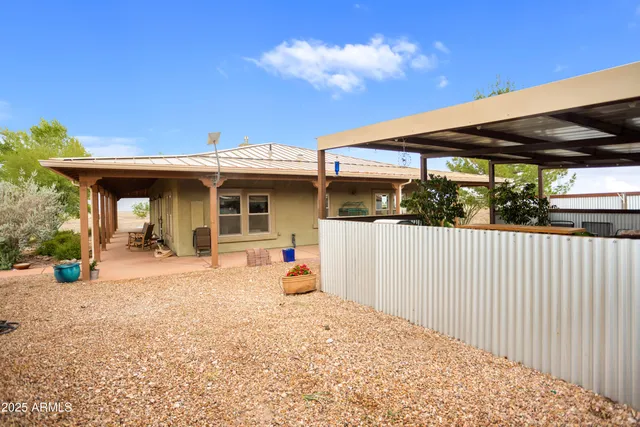 a kitchen with a stove a sink and a refrigerator