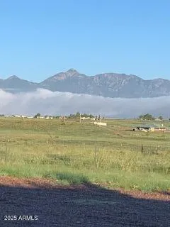 a large kitchen with a stove sink and cabinets