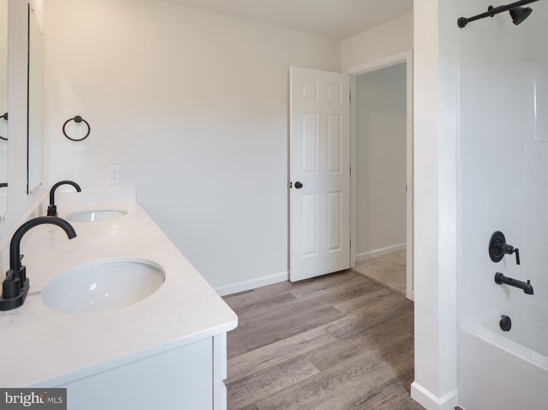 307 Boxwood Drive Windsor, PA 17366 - Photo 25 of 43 a bathroom with a sink and a tub
