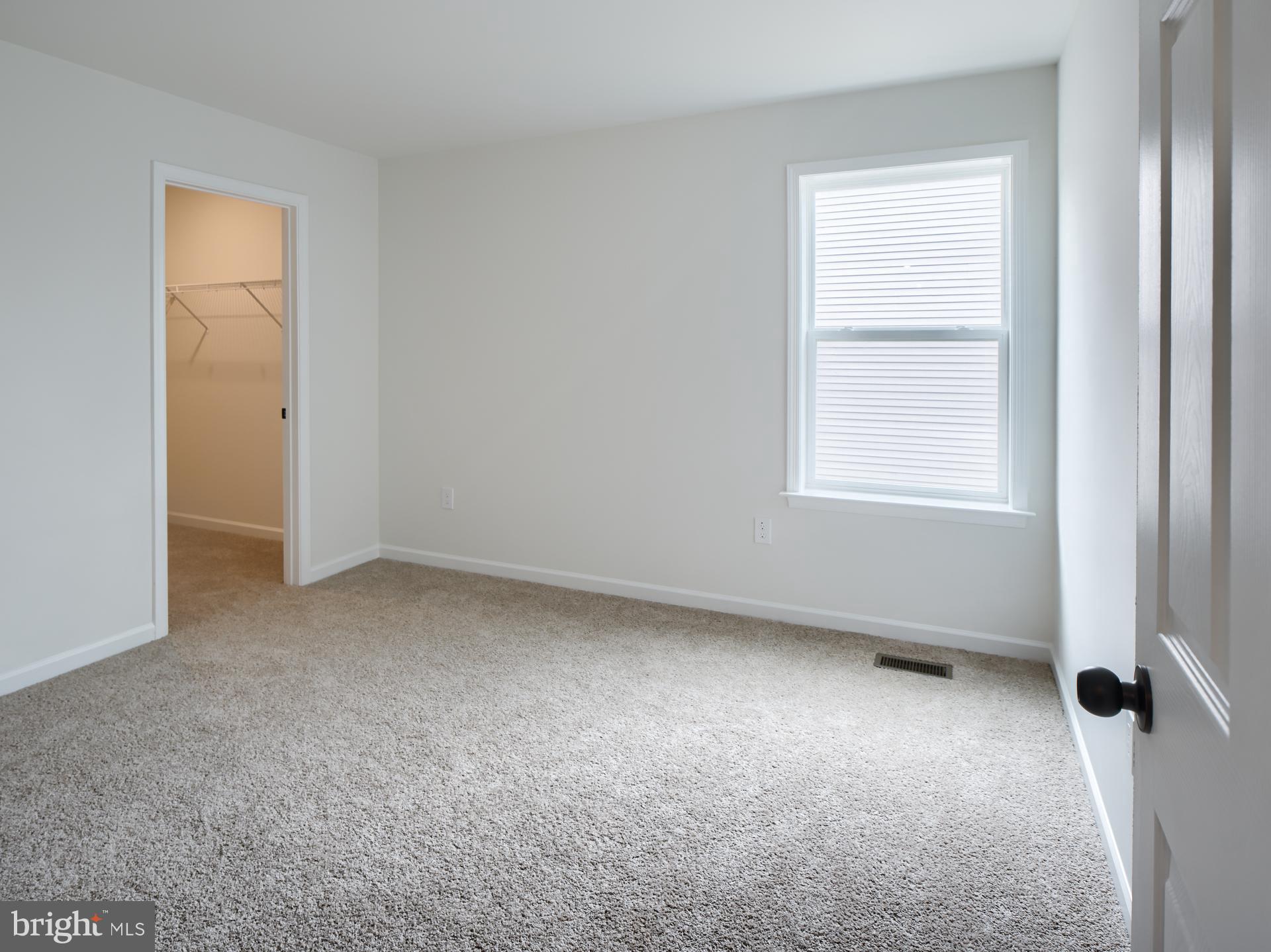 307 Boxwood Drive Windsor, PA 17366 - Photo 29 of 43 an empty room with windows