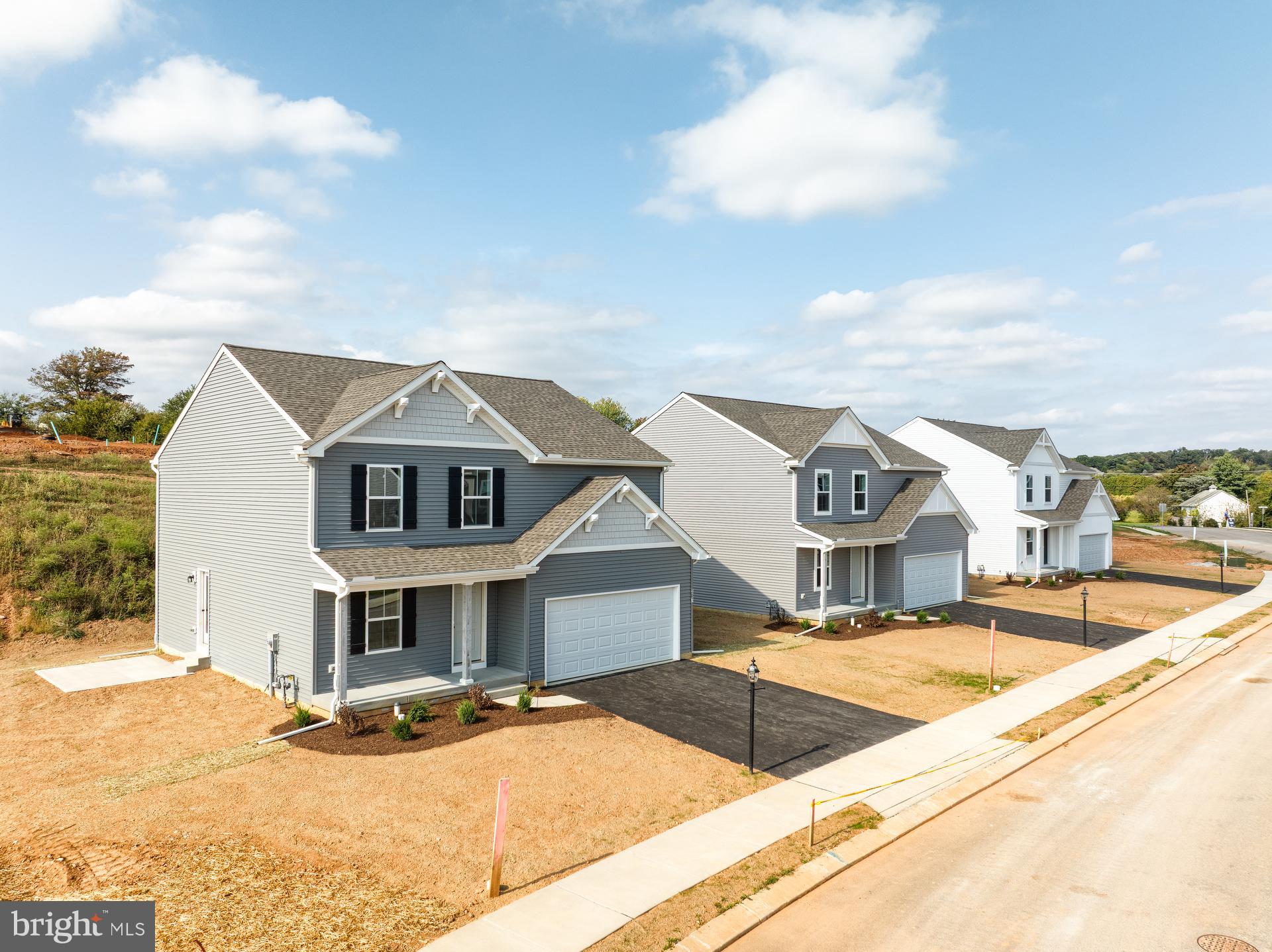 307 Boxwood Drive Windsor, PA 17366 - Photo 38 of 43 a front view of a house with yard and balcony