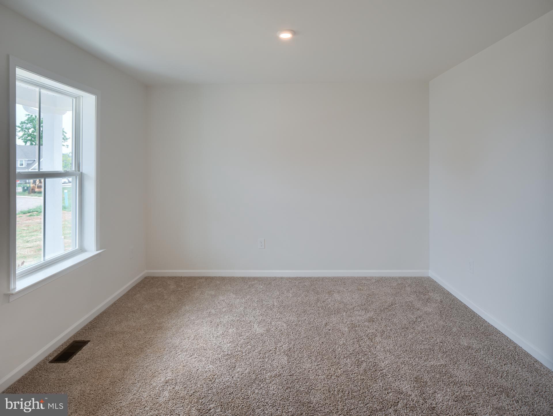 307 Boxwood Drive Windsor, PA 17366 - Photo 8 of 43 an empty room with a window