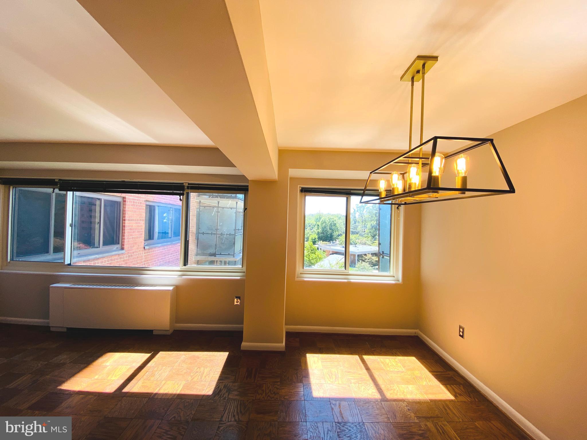 4201 Cathedral Avenue Northwest, Unit 622E Washington, DC 20016 - Photo 14 of 34 a view of an empty room with a window