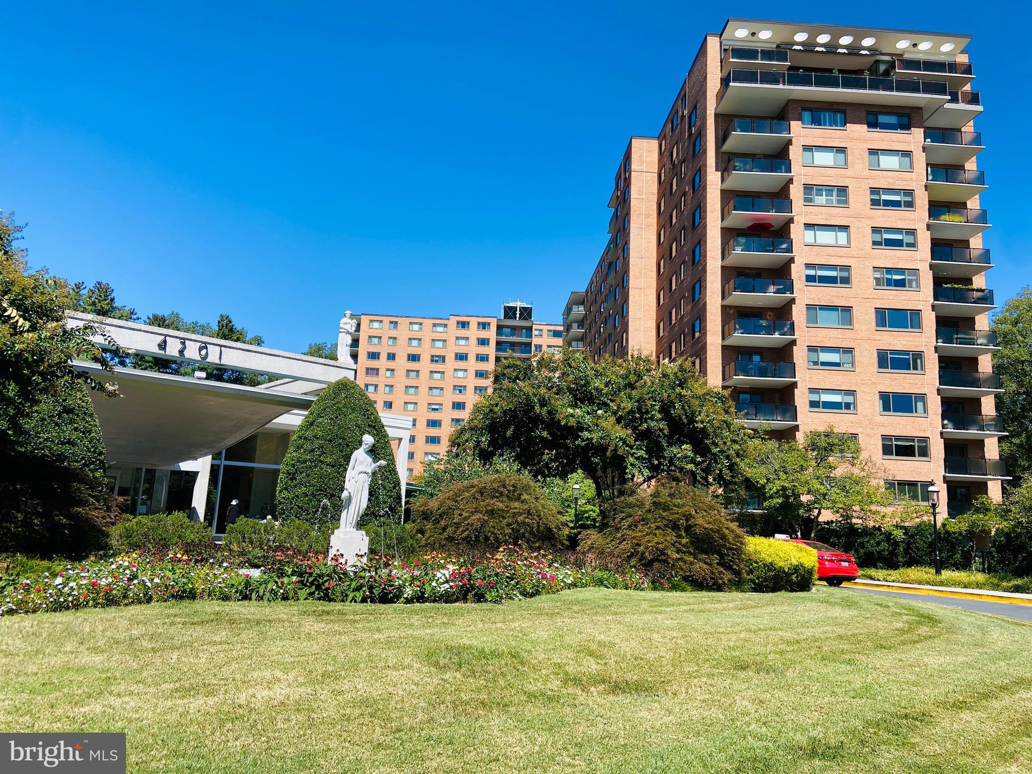 4201 Cathedral Avenue Northwest, Unit 622E Washington, DC 20016 - Photo 3 of 34 a view of front of house with a yard