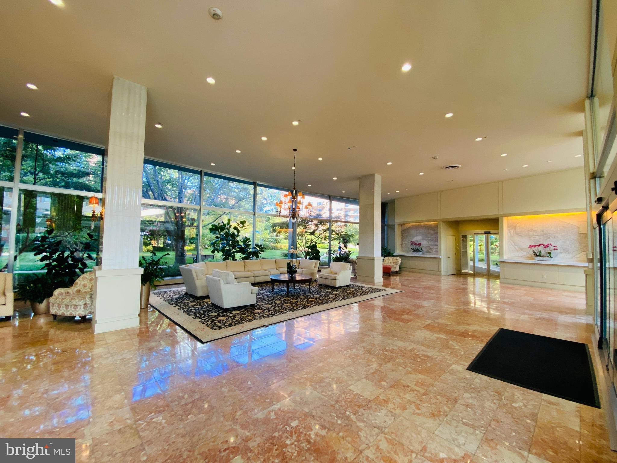 4201 Cathedral Avenue Northwest, Unit 622E Washington, DC 20016 - Photo 4 of 34 a living room with couch and a large window