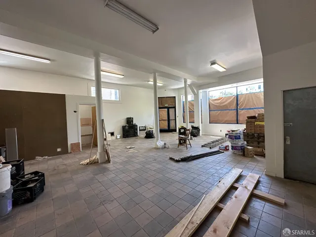 a view of storage and utility room with washer and dryer