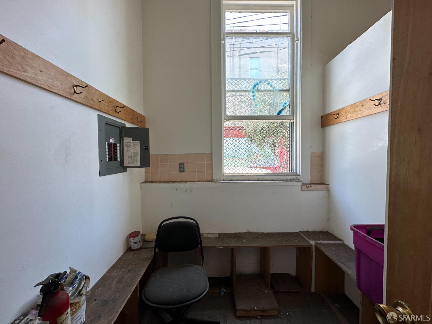 3572 20th Street San Francisco, CA 94110 - Photo 13 of 17 a room with furniture and a window