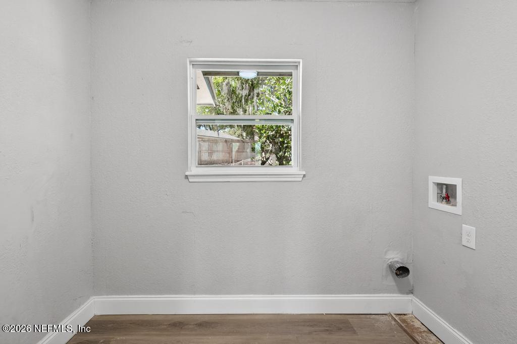 4040 Cove St Johns Road Jacksonville, FL 32277 - Photo 30 of 101 a view of a small space with wooden floor and a window