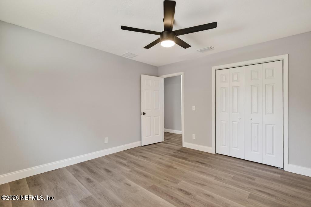 4040 Cove St Johns Road Jacksonville, FL 32277 - Photo 35 of 101 wooden floor in an empty room