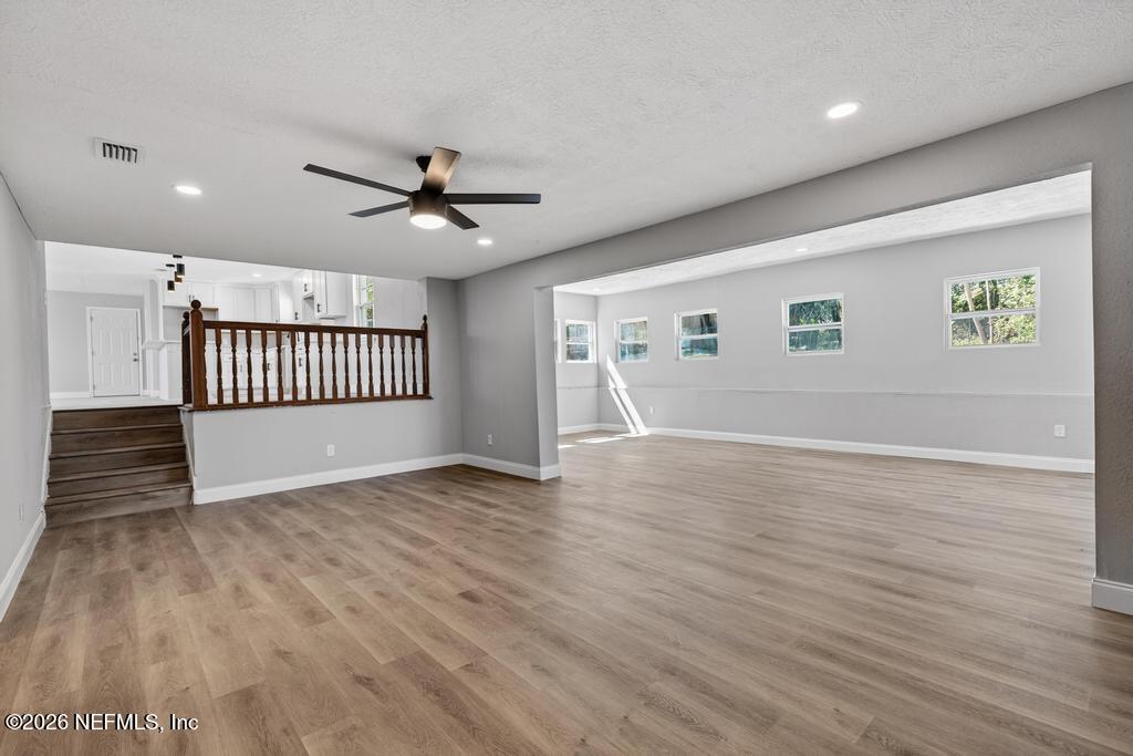 4040 Cove St Johns Road Jacksonville, FL 32277 - Photo 53 of 101 a view of livingroom with hardwood floor and a ceiling fan