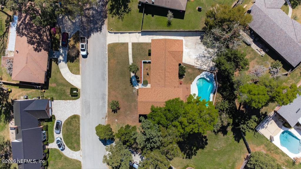 4040 Cove St Johns Road Jacksonville, FL 32277 - Photo 79 of 101 an aerial view of a house with a yard and garden
