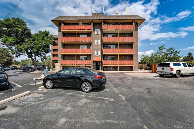 a car parked in front of a building