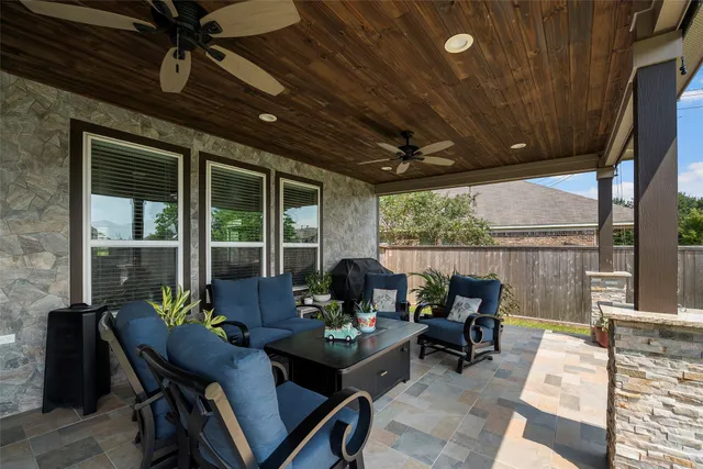 a bedroom with a large bed and a dresser