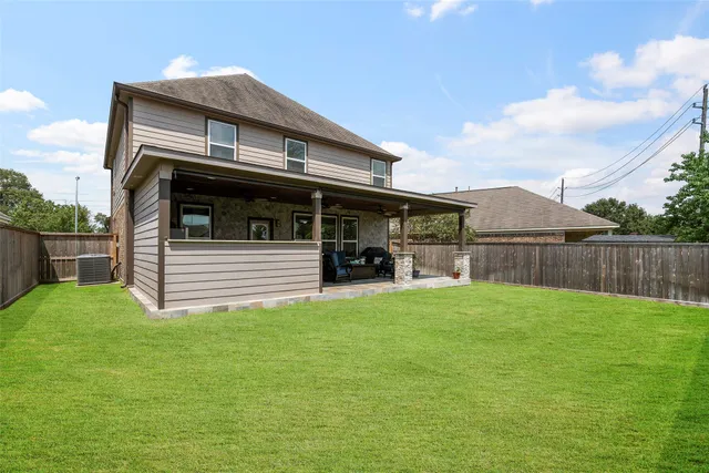 a view of a hallway with washer and dryer