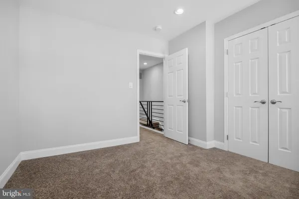 an empty room with an entryway