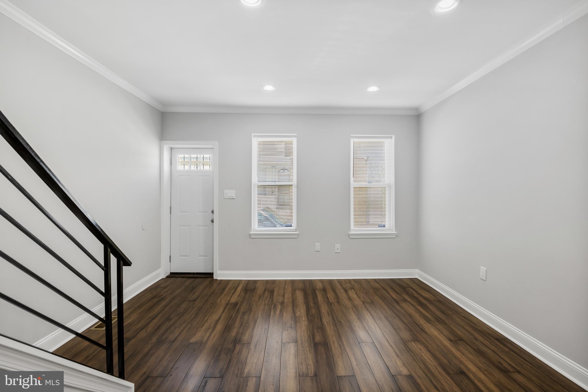 3025 Janney Street Philadelphia, PA 19134 - Photo 4 of 24 wooden floor in an empty room with a window